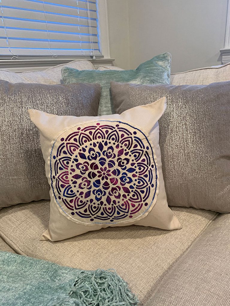 ombre medallion stencil painted on fabric and embroidered on decorative pillow