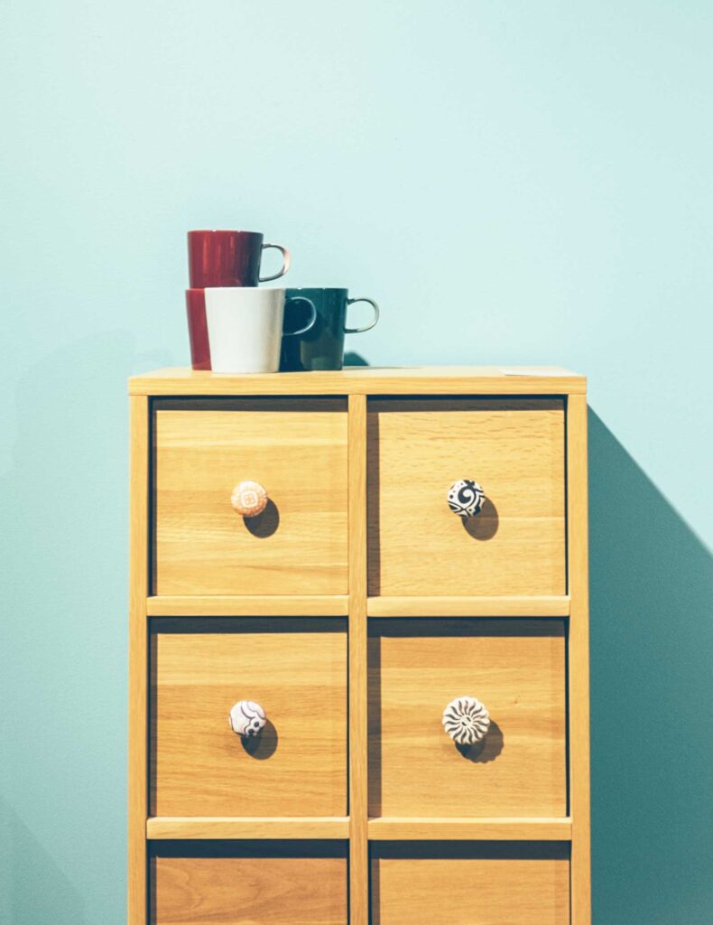 Wood Dresser with mismatched knobs