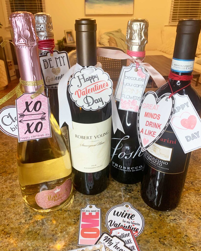 wine bottles with Valentines day tags
