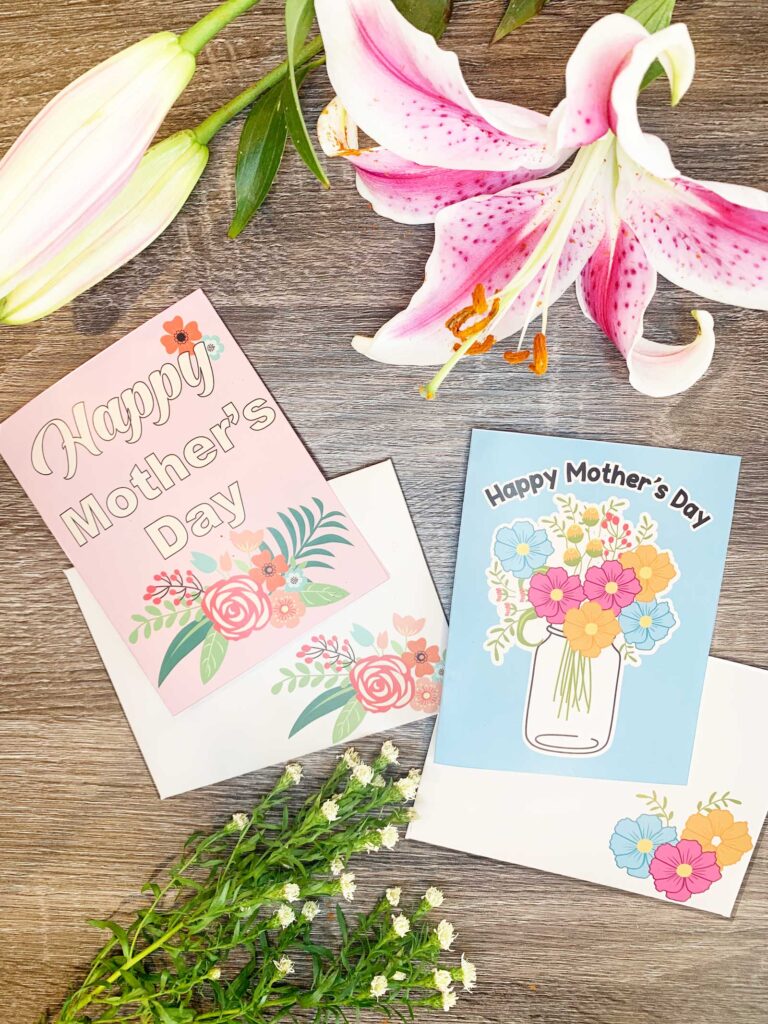 two mothers day cards on table with flowers one 