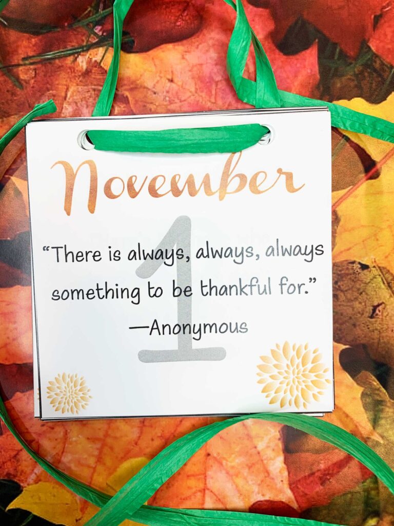 November Calendar Printable showing November 1 with the quote "there is always something to be thankful for"