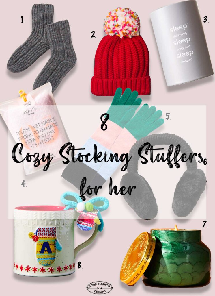 8 cozy stocking stuffers for her showing grey socks, red hat with pom pom, sleep pad, hair towel, gloves, black earmuffs, mug with initial