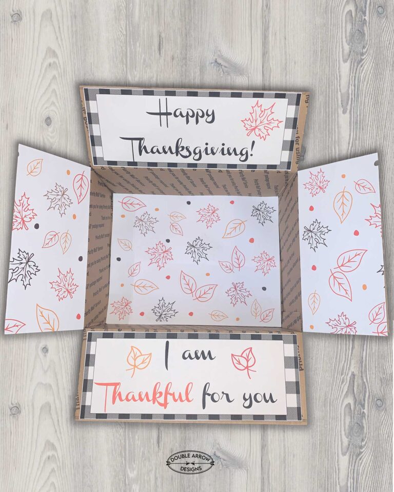 thanksgiving day care package box with flaps open. Labels on each flap one saying happy thanksgiving and another I am thankful for you. the other two flaps with printed leaves.