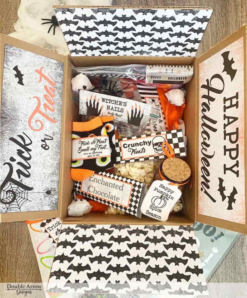 halloween care package box filled with halloween treats