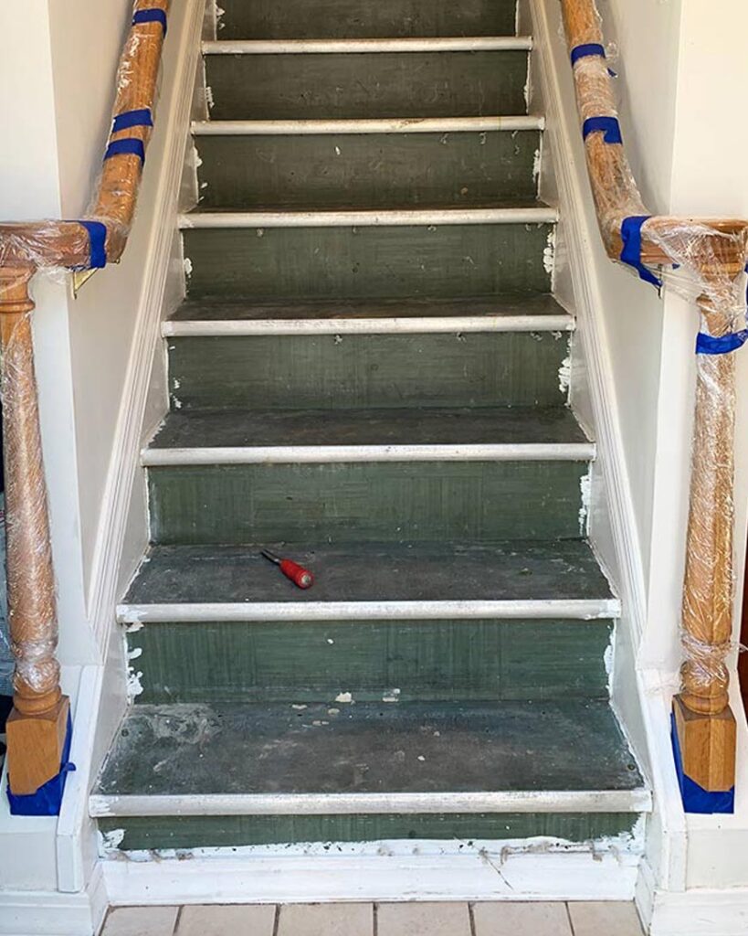 staircase unfinished showing green old stairs and risers